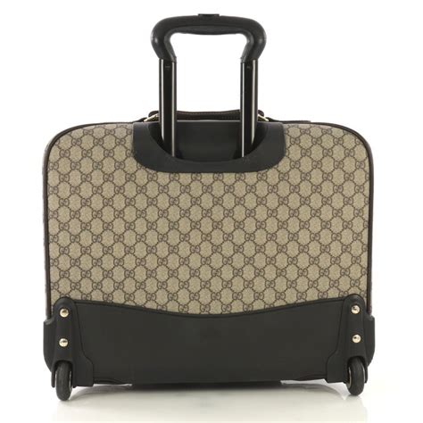 gucci rolling luggage